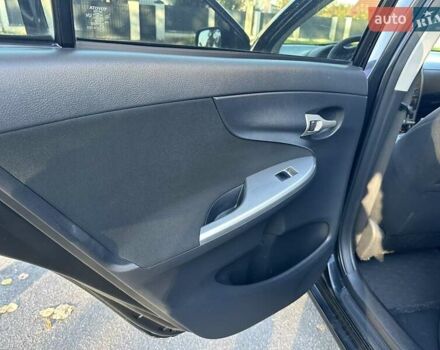 Чорний Тойота Королла, об'ємом двигуна 1.6 л та пробігом 193 тис. км за 5999 $, фото 27 на Automoto.ua