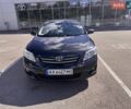 Чорний Тойота Королла, об'ємом двигуна 1.6 л та пробігом 215 тис. км за 6400 $, фото 1 на Automoto.ua