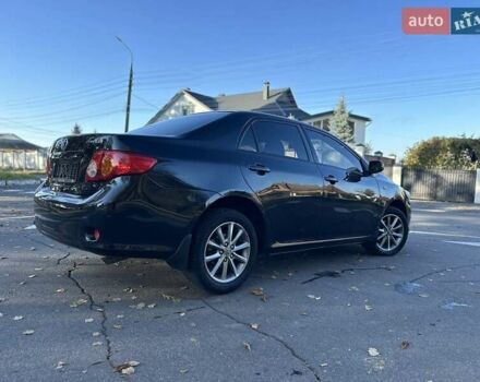 Чорний Тойота Королла, об'ємом двигуна 1.6 л та пробігом 193 тис. км за 5999 $, фото 44 на Automoto.ua