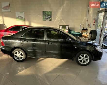 Черный Тойота Королла, объемом двигателя 1.8 л и пробегом 300 тыс. км за 6900 $, фото 1 на Automoto.ua