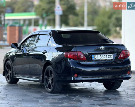 Чорний Тойота Королла, об'ємом двигуна 1.6 л та пробігом 221 тис. км за 6799 $, фото 3 на Automoto.ua