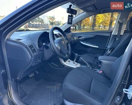 Чорний Тойота Королла, об'ємом двигуна 1.6 л та пробігом 193 тис. км за 5999 $, фото 23 на Automoto.ua