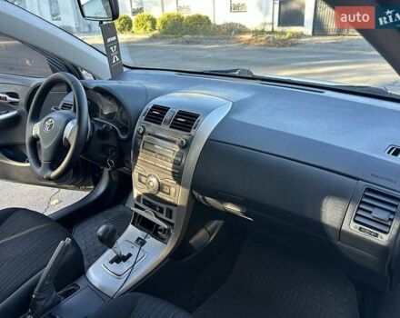 Чорний Тойота Королла, об'ємом двигуна 1.6 л та пробігом 193 тис. км за 5999 $, фото 5 на Automoto.ua