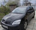 Черный Тойота Королла, объемом двигателя 1.59 л и пробегом 250 тыс. км за 4000 $, фото 1 на Automoto.ua
