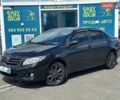 Черный Тойота Королла, объемом двигателя 1.6 л и пробегом 250 тыс. км за 5990 $, фото 1 на Automoto.ua