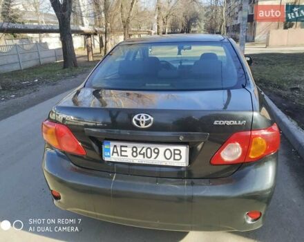 Чорний Тойота Королла, об'ємом двигуна 1.6 л та пробігом 215 тис. км за 7500 $, фото 3 на Automoto.ua