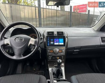 Чорний Тойота Королла, об'ємом двигуна 1.6 л та пробігом 316 тис. км за 7490 $, фото 12 на Automoto.ua