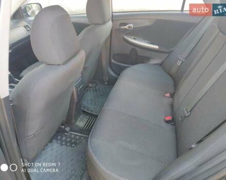 Чорний Тойота Королла, об'ємом двигуна 1.6 л та пробігом 215 тис. км за 7500 $, фото 4 на Automoto.ua