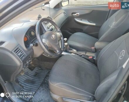 Чорний Тойота Королла, об'ємом двигуна 1.6 л та пробігом 215 тис. км за 7500 $, фото 5 на Automoto.ua