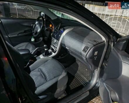 Чорний Тойота Королла, об'ємом двигуна 1.6 л та пробігом 207 тис. км за 6900 $, фото 16 на Automoto.ua