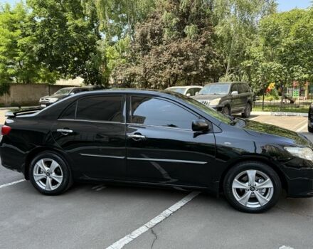 Чорний Тойота Королла, об'ємом двигуна 1.8 л та пробігом 191 тис. км за 7599 $, фото 3 на Automoto.ua