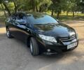 Черный Тойота Королла, объемом двигателя 1.6 л и пробегом 198 тыс. км за 7950 $, фото 1 на Automoto.ua