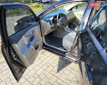 Чорний Тойота Королла, об'ємом двигуна 1.6 л та пробігом 195 тис. км за 8500 $, фото 11 на Automoto.ua