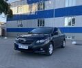 Чорний Тойота Королла, об'ємом двигуна 1.6 л та пробігом 244 тис. км за 8350 $, фото 1 на Automoto.ua