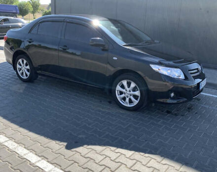 Чорний Тойота Королла, об'ємом двигуна 1.6 л та пробігом 223 тис. км за 7500 $, фото 6 на Automoto.ua