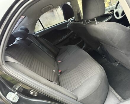 Черный Тойота Королла, объемом двигателя 1.6 л и пробегом 149 тыс. км за 6100 $, фото 17 на Automoto.ua