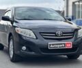 Черный Тойота Королла, объемом двигателя 1.6 л и пробегом 186 тыс. км за 7990 $, фото 2 на Automoto.ua
