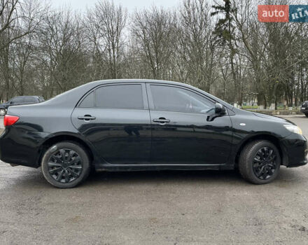 Чорний Тойота Королла, об'ємом двигуна 1.6 л та пробігом 208 тис. км за 7200 $, фото 4 на Automoto.ua