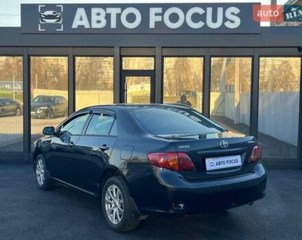 Черный Тойота Королла, объемом двигателя 1.6 л и пробегом 186 тыс. км за 6990 $, фото 4 на Automoto.ua