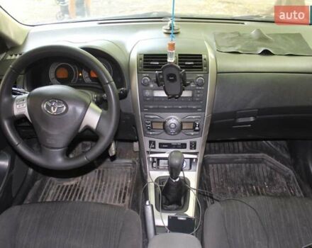 Черный Тойота Королла, объемом двигателя 1.6 л и пробегом 250 тыс. км за 5000 $, фото 1 на Automoto.ua