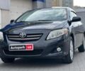 Черный Тойота Королла, объемом двигателя 1.6 л и пробегом 186 тыс. км за 7990 $, фото 1 на Automoto.ua