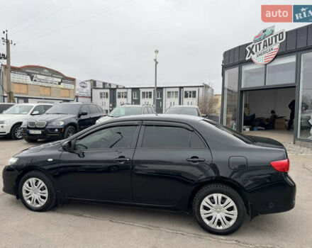 Черный Тойота Королла, объемом двигателя 1.6 л и пробегом 221 тыс. км за 6999 $, фото 7 на Automoto.ua