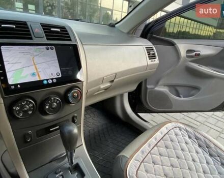 Черный Тойота Королла, объемом двигателя 1.8 л и пробегом 240 тыс. км за 7999 $, фото 11 на Automoto.ua