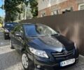 Чорний Тойота Королла, об'ємом двигуна 1.6 л та пробігом 210 тис. км за 6600 $, фото 1 на Automoto.ua
