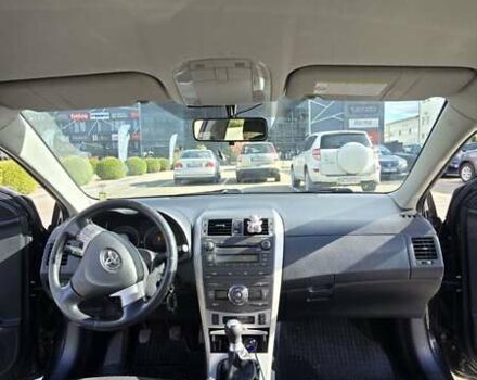 Черный Тойота Королла, объемом двигателя 1.6 л и пробегом 244 тыс. км за 6950 $, фото 19 на Automoto.ua