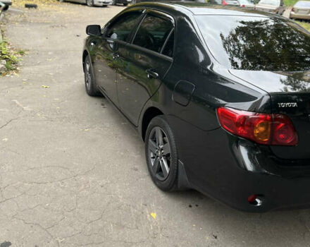 Чорний Тойота Королла, об'ємом двигуна 1.6 л та пробігом 147 тис. км за 7700 $, фото 4 на Automoto.ua