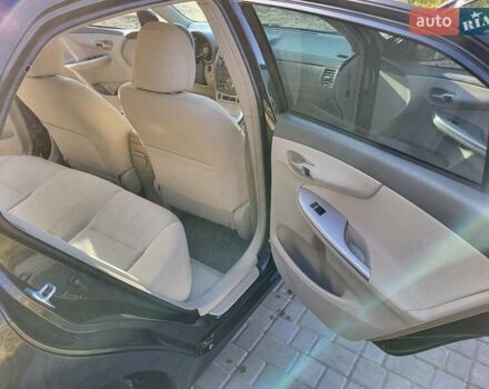 Чорний Тойота Королла, об'ємом двигуна 1.6 л та пробігом 195 тис. км за 8500 $, фото 6 на Automoto.ua