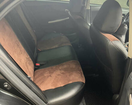 Чорний Тойота Королла, об'ємом двигуна 1.6 л та пробігом 147 тис. км за 7700 $, фото 11 на Automoto.ua