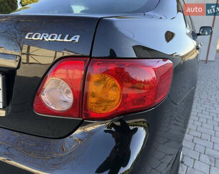 Черный Тойота Королла, объемом двигателя 1.6 л и пробегом 147 тыс. км за 6999 $, фото 39 на Automoto.ua