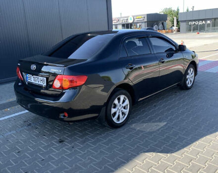 Чорний Тойота Королла, об'ємом двигуна 1.6 л та пробігом 223 тис. км за 7000 $, фото 3 на Automoto.ua