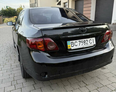 Чорний Тойота Королла, об'ємом двигуна 1.6 л та пробігом 235 тис. км за 5500 $, фото 7 на Automoto.ua