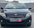 Черный Тойота Королла, объемом двигателя 1.6 л и пробегом 186 тыс. км за 7990 $, фото 1 на Automoto.ua