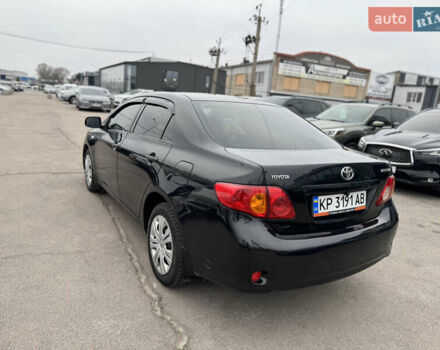 Черный Тойота Королла, объемом двигателя 1.6 л и пробегом 221 тыс. км за 6999 $, фото 6 на Automoto.ua