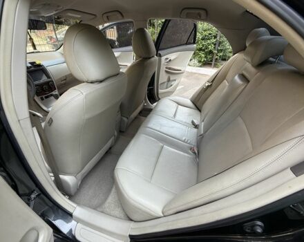 Чорний Тойота Королла, об'ємом двигуна 1.8 л та пробігом 191 тис. км за 7599 $, фото 11 на Automoto.ua