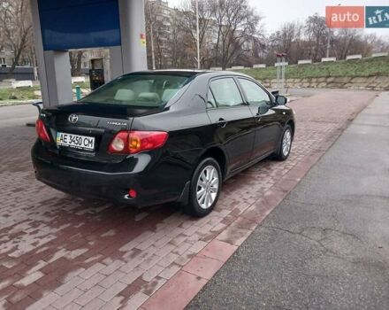 Чорний Тойота Королла, об'ємом двигуна 1.6 л та пробігом 132 тис. км за 7985 $, фото 1 на Automoto.ua