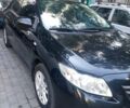 Чорний Тойота Королла, об'ємом двигуна 1.6 л та пробігом 185 тис. км за 7900 $, фото 1 на Automoto.ua
