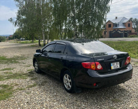 Чорний Тойота Королла, об'ємом двигуна 1.8 л та пробігом 38 тис. км за 7100 $, фото 4 на Automoto.ua