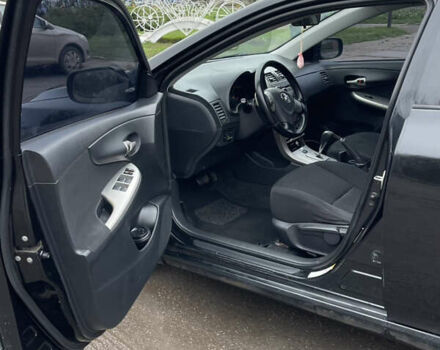 Чорний Тойота Королла, об'ємом двигуна 1.6 л та пробігом 208 тис. км за 7200 $, фото 13 на Automoto.ua