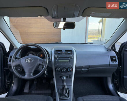 Черный Тойота Королла, объемом двигателя 1.6 л и пробегом 147 тыс. км за 6999 $, фото 52 на Automoto.ua