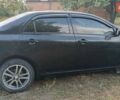 Чорний Тойота Королла, об'ємом двигуна 1.6 л та пробігом 215 тис. км за 6200 $, фото 7 на Automoto.ua