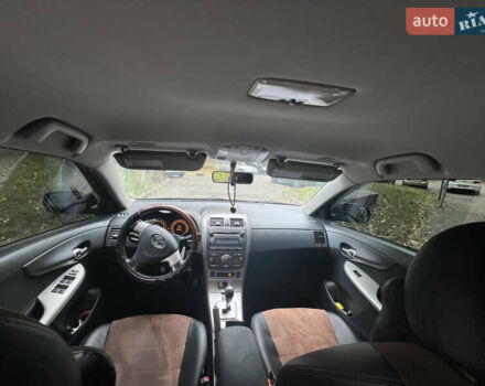 Чорний Тойота Королла, об'ємом двигуна 1.6 л та пробігом 147 тис. км за 7700 $, фото 9 на Automoto.ua