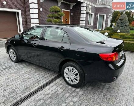 Чорний Тойота Королла, об'ємом двигуна 1.6 л та пробігом 49 тис. км за 9999 $, фото 6 на Automoto.ua