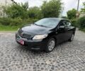 Чорний Тойота Королла, об'ємом двигуна 1.6 л та пробігом 183 тис. км за 6990 $, фото 1 на Automoto.ua
