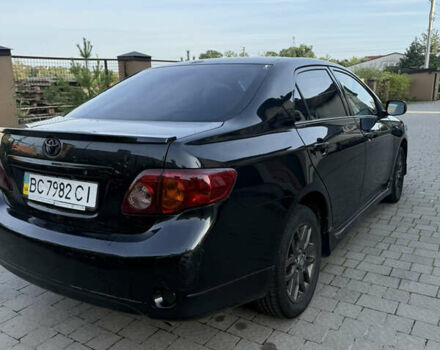 Чорний Тойота Королла, об'ємом двигуна 1.6 л та пробігом 235 тис. км за 5500 $, фото 6 на Automoto.ua