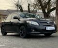 Чорний Тойота Королла, об'ємом двигуна 16 л та пробігом 210 тис. км за 7400 $, фото 1 на Automoto.ua