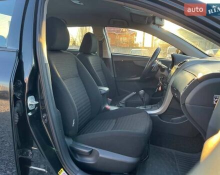 Черный Тойота Королла, объемом двигателя 1.6 л и пробегом 186 тыс. км за 7490 $, фото 10 на Automoto.ua